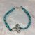 Tulipános karkötő, türkizes paracord zsinórral