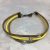 Színes, bogyós karkötő, sárga és arany színben
